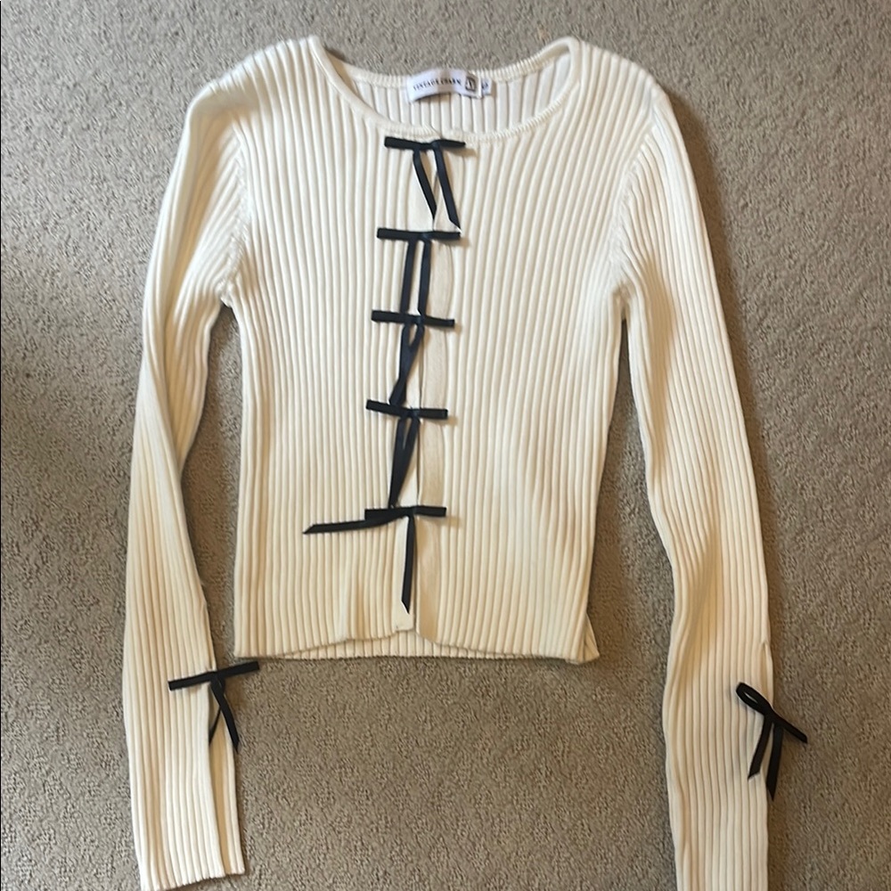 Cream Ribbed Top with Black Ribbon Accents